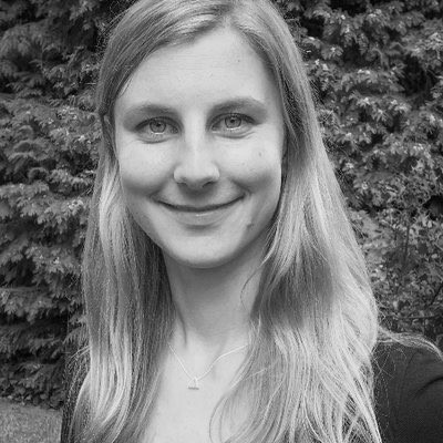 A black and white photo of Caroline Verfuerth, research associate